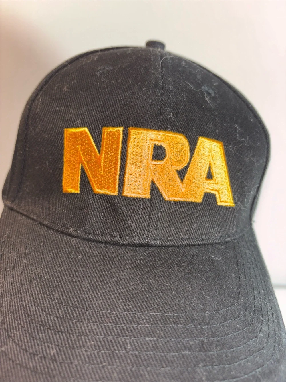 NRA Black Baseball Cap with Yellow Embroidery